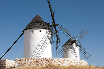 Image showing White ancient windmills