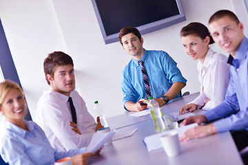 Image showing business people in a meeting at office