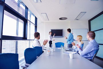 Image showing business people in a meeting at office