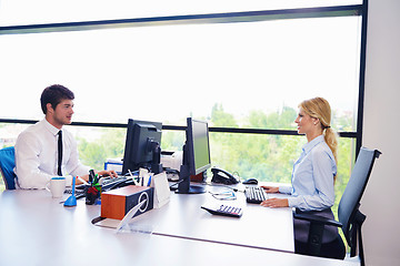 Image showing business people in a meeting at office