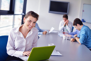 Image showing business people in a meeting at office