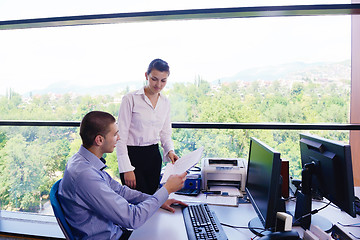 Image showing business people in a meeting at office