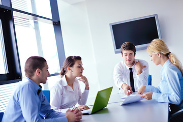 Image showing business people in a meeting at office