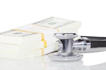 Image showing stethoscope and dollars