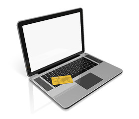 Image showing gold credit card on laptop