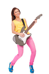 Image showing woman punk rock star playing 