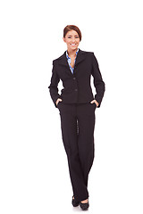 Image showing businesswoman with hands in pockets