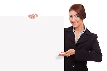 Image showing  business woman showing blank signboard