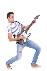 Image showing young man playing guitar