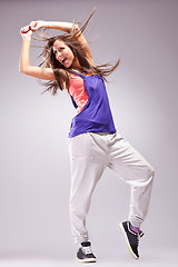 Image showing modern style dancer posing and screaming