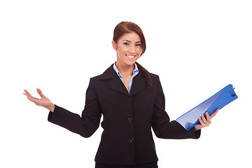 Image showing business woman holding a  clipboard and welcoming