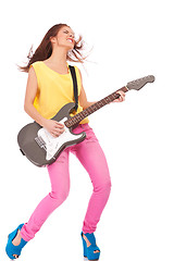 Image showing Young woman playing the guitar 