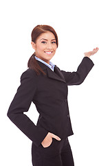 Image showing Confident business woman presenting