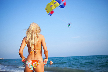 Image showing woman looking forward to a paragliding adventure