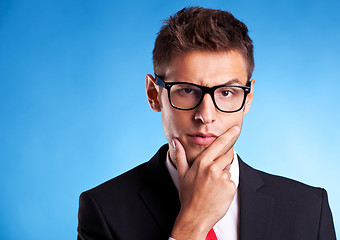 Image showing pensive young business man