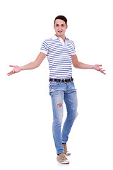 Image showing casual man gesturing welcome