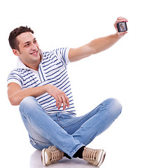 Image showing man taking a picture of him self with phone