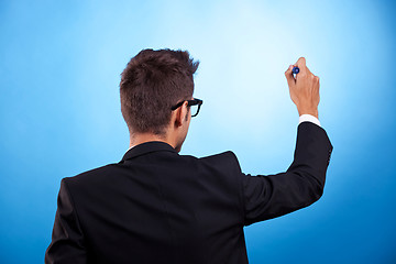 Image showing business man writing with marker