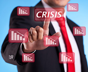 Image showing business man pressing a crisis button