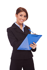 Image showing smiling business woman with blue clipboard