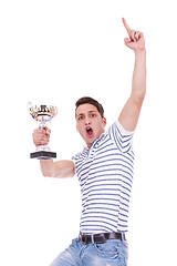 Image showing young casual man winning a trophy