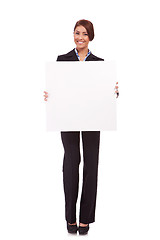 Image showing business woman showing a blank board