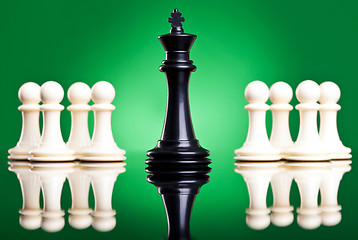 Image showing black king in front of white pawns