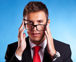 Image showing young business man with a nerd glasses