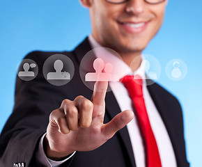 Image showing Business man pressing round social buttons