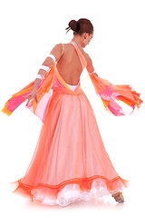 Image showing  woman dancer dressed in a beautiful long orange dress