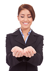 Image showing business woman holding something