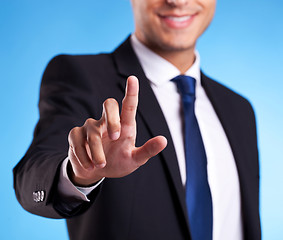 Image showing Business man pressing an imaginary button