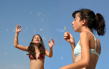 Image showing Girls with bubbles