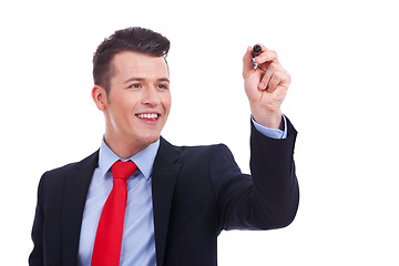 Image showing Business man writing with marker