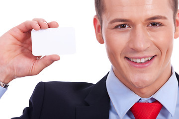 Image showing Business man showing a blank business card