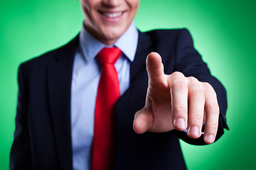 Image showing business man pressing an imaginary button