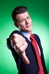 Image showing business man with thumbs down