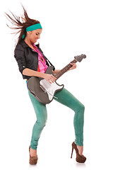 Image showing  woman guitarist playing rock and roll 