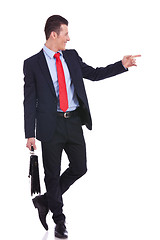 Image showing business man pointing to his side