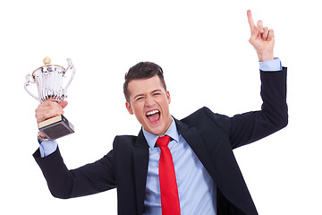 Image showing victory roar of a young businss man