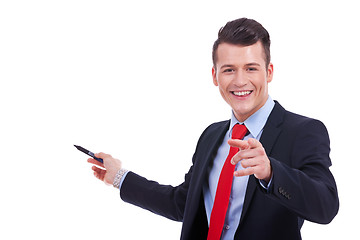Image showing business man presenting and pointing