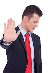 Image showing Business man showing stop gesture 