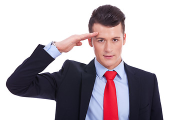 Image showing Business man gives salute 