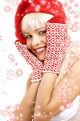 Image showing santa helper girl with snowflakes