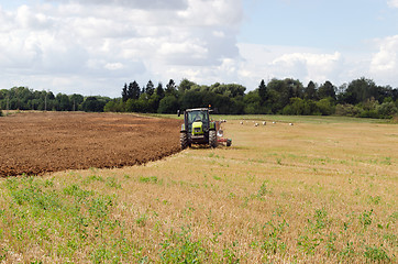 Image showing tractor plow autumn field stork 