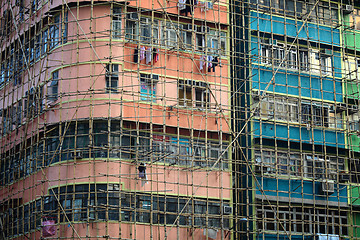 Image showing bamboo scaffolding of repairing old building