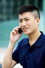 Image showing asian man with cell phone