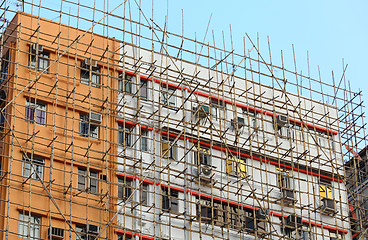 Image showing bamboo scaffolding of repairing old building