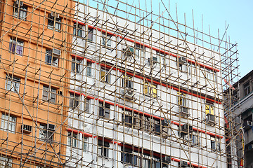 Image showing bamboo scaffolding of repairing old building