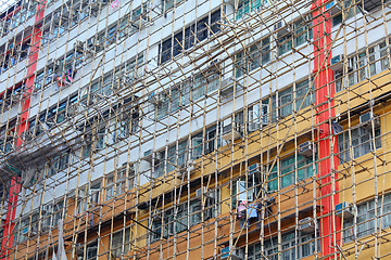 Image showing bamboo scaffolding of repairing old building